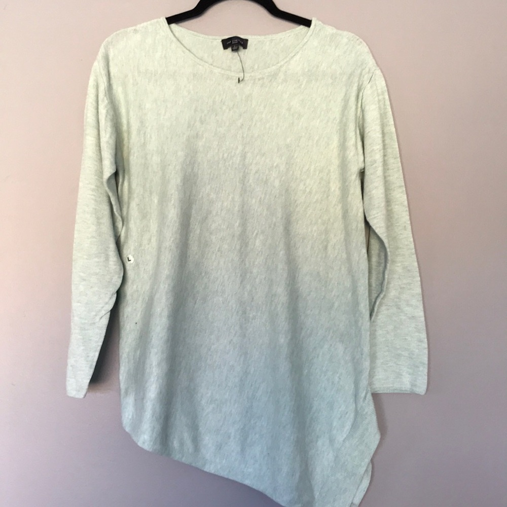 The limited shirt size large